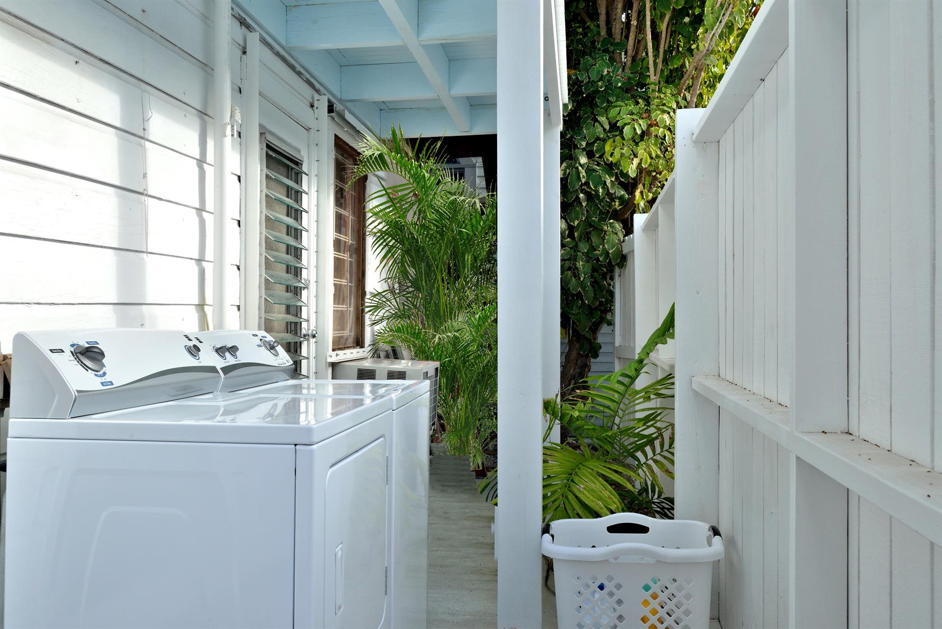 Washer and dryer located just outside.