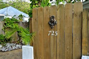 Our entrance is artsy and funky in this adorable Key West home