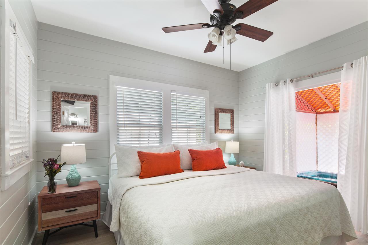 Bedroom offers a comfy King bed and patio access.