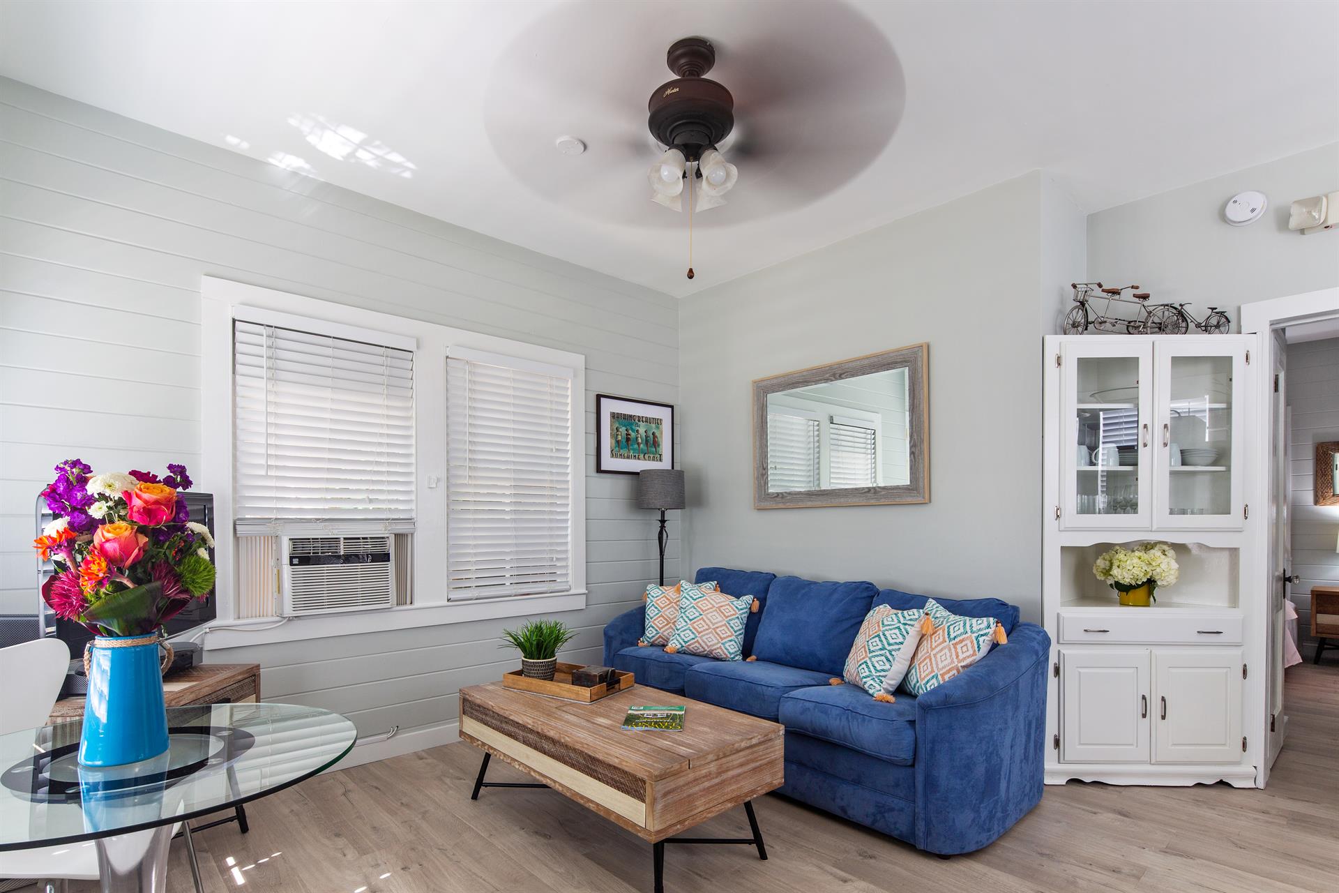 Updated living area with queen sized pull out sleeper sofa.