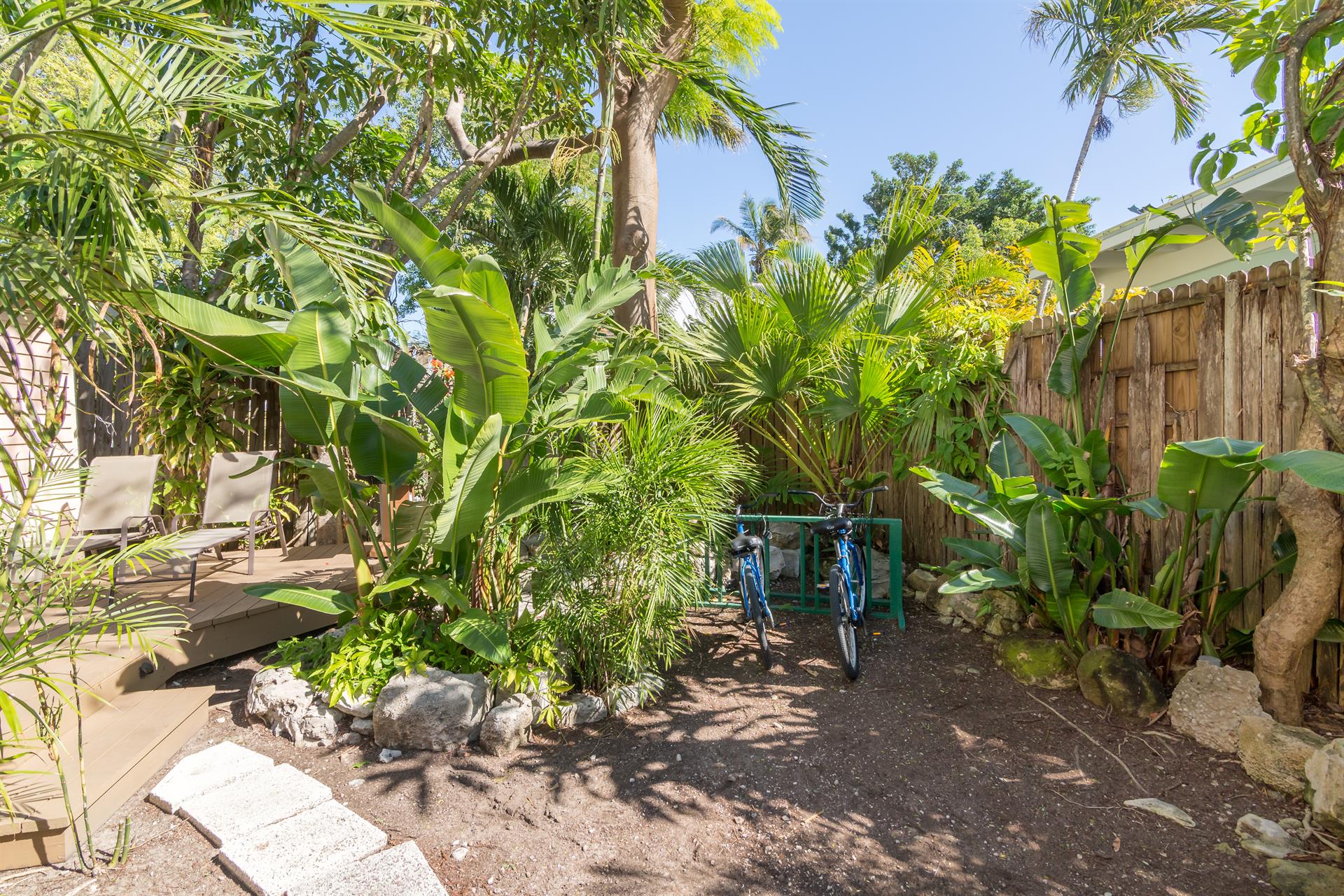 View of common area grounds and private bike rack.