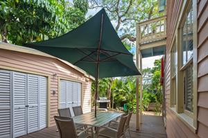 Covered outdoor dining area, shared between Treetop  Garden.