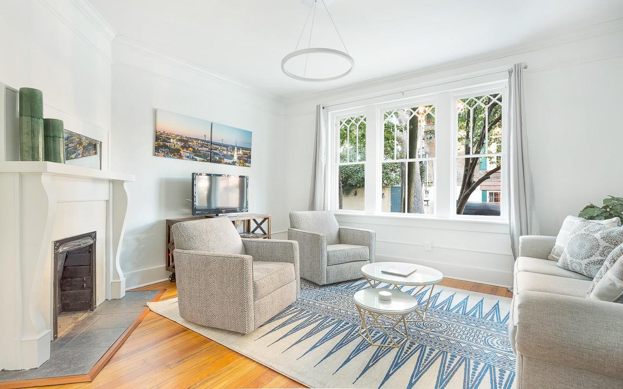 First Floor Condo w/ Large Living Area in Historic Dist. by Lucky Savannah