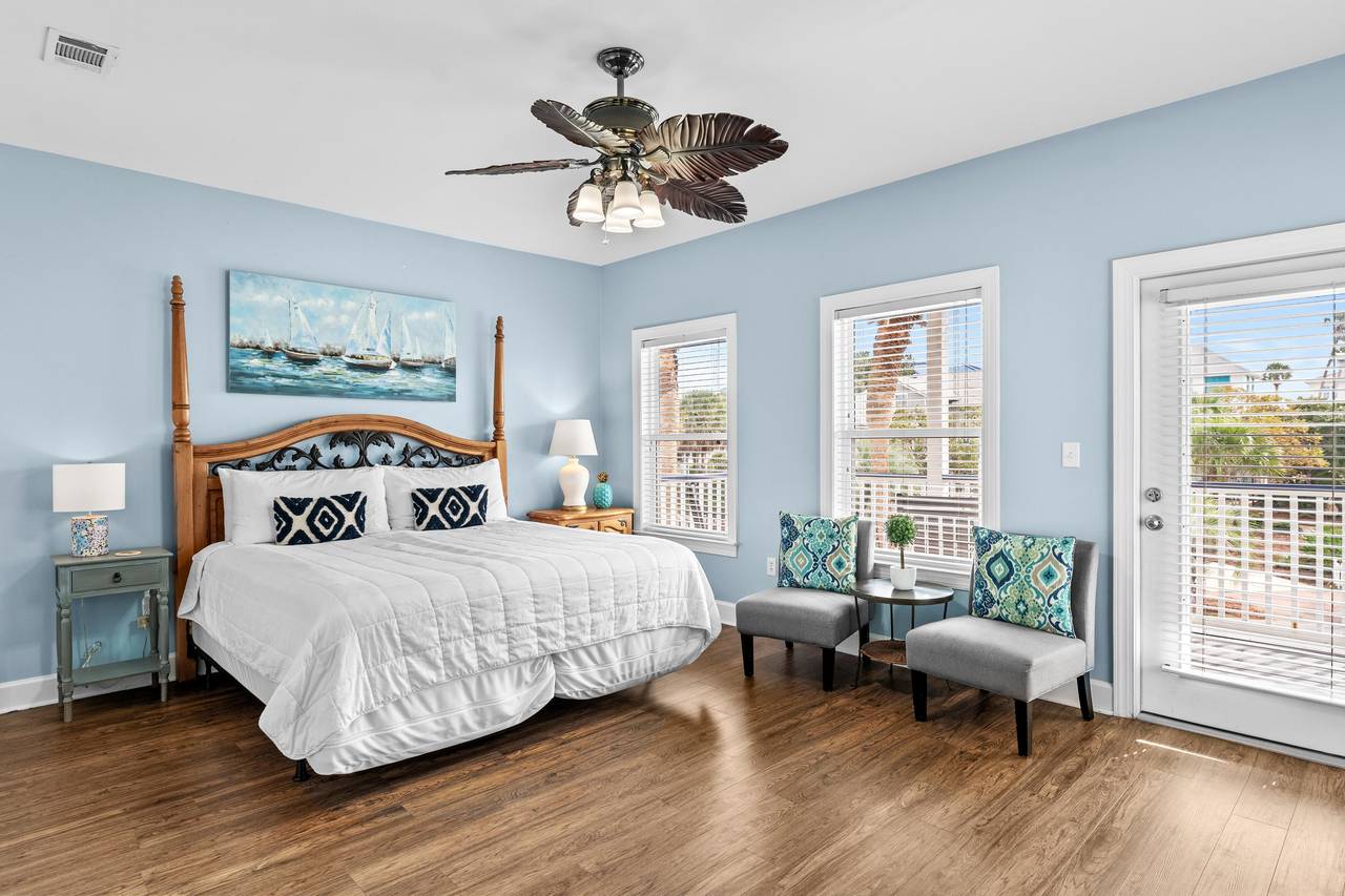 Second floor Primary Bedroom with seating and Private Balcony Access