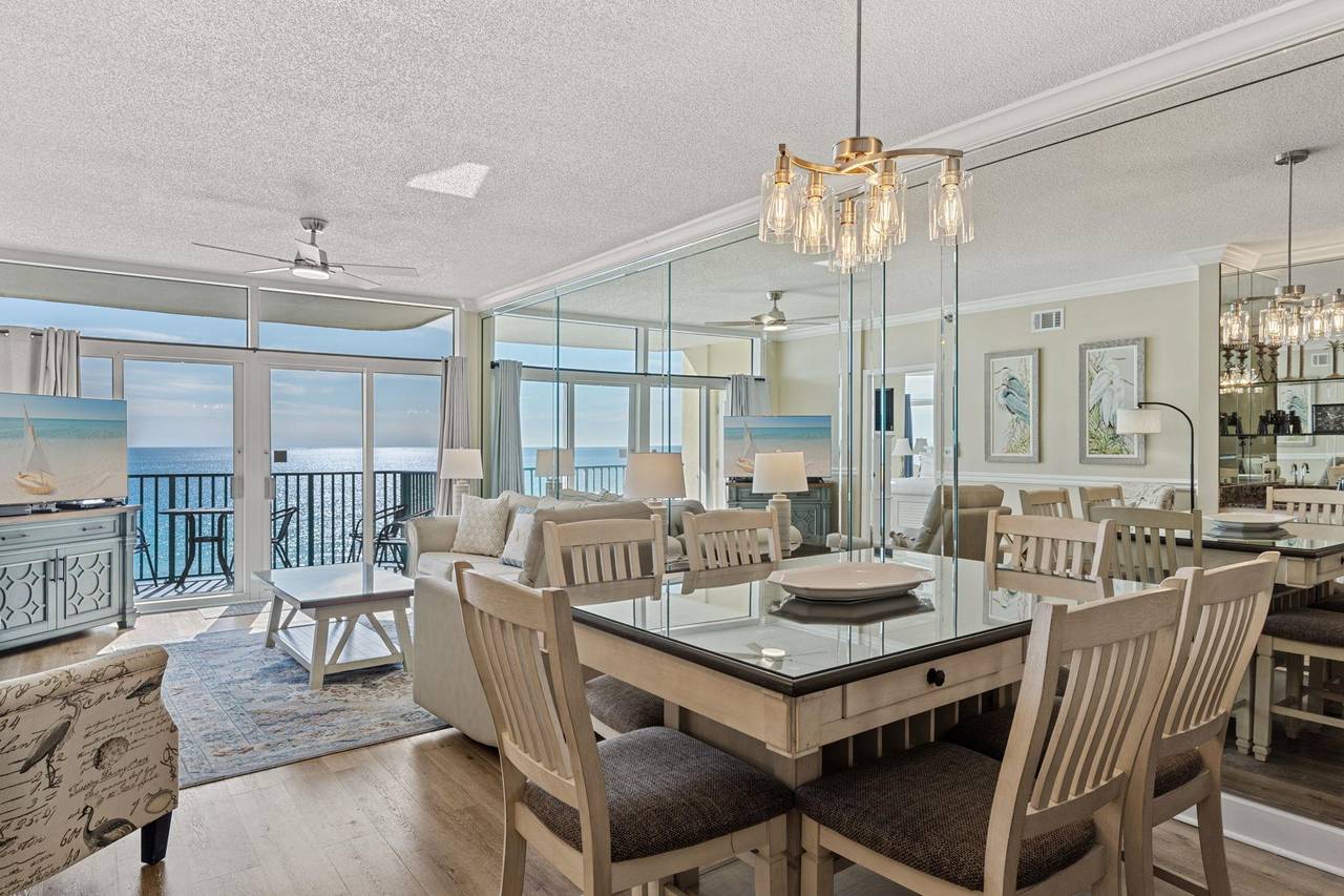 A bright, elegant dining space with beach views.