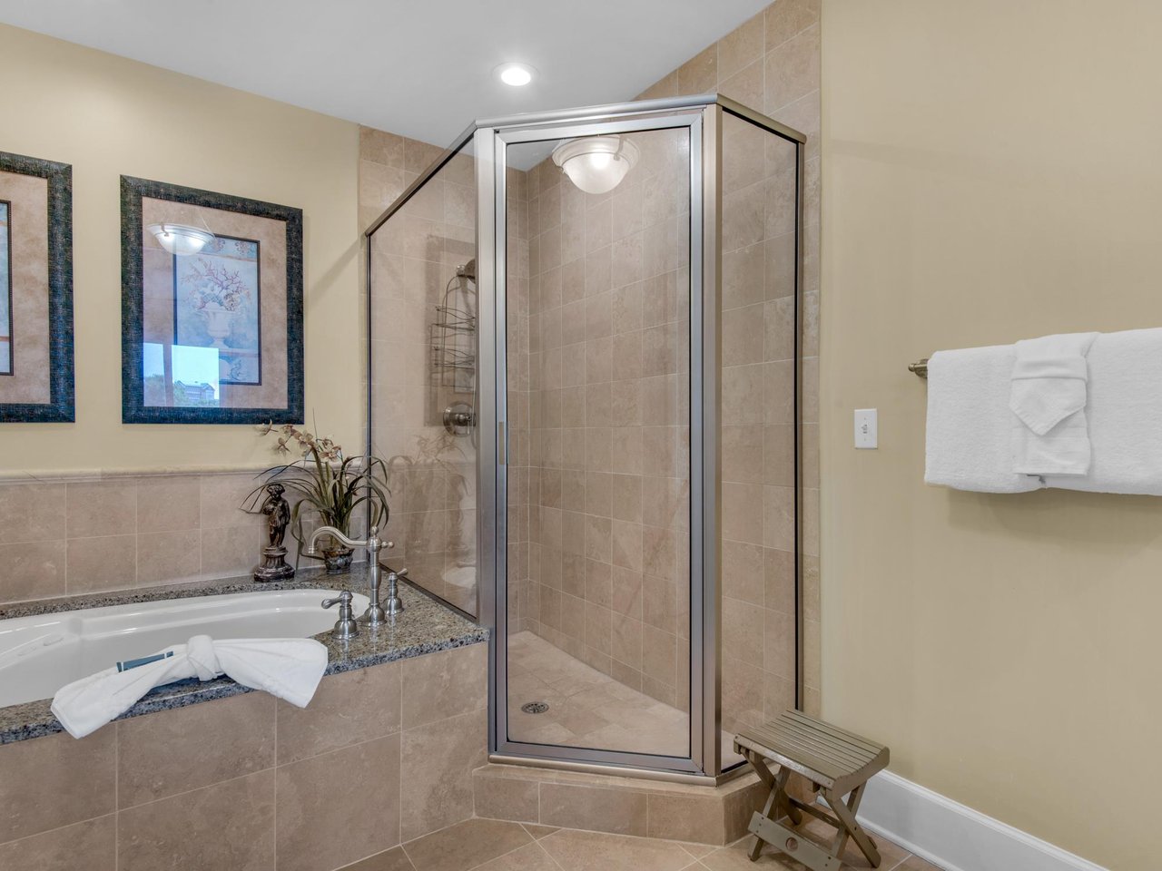 Primary bathroom with garden tub and walk in shower