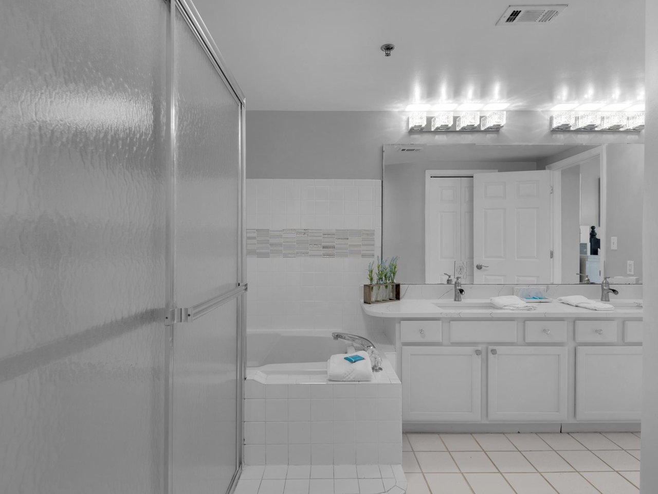 Primary Bathroom with WalkIn Shower and Tub