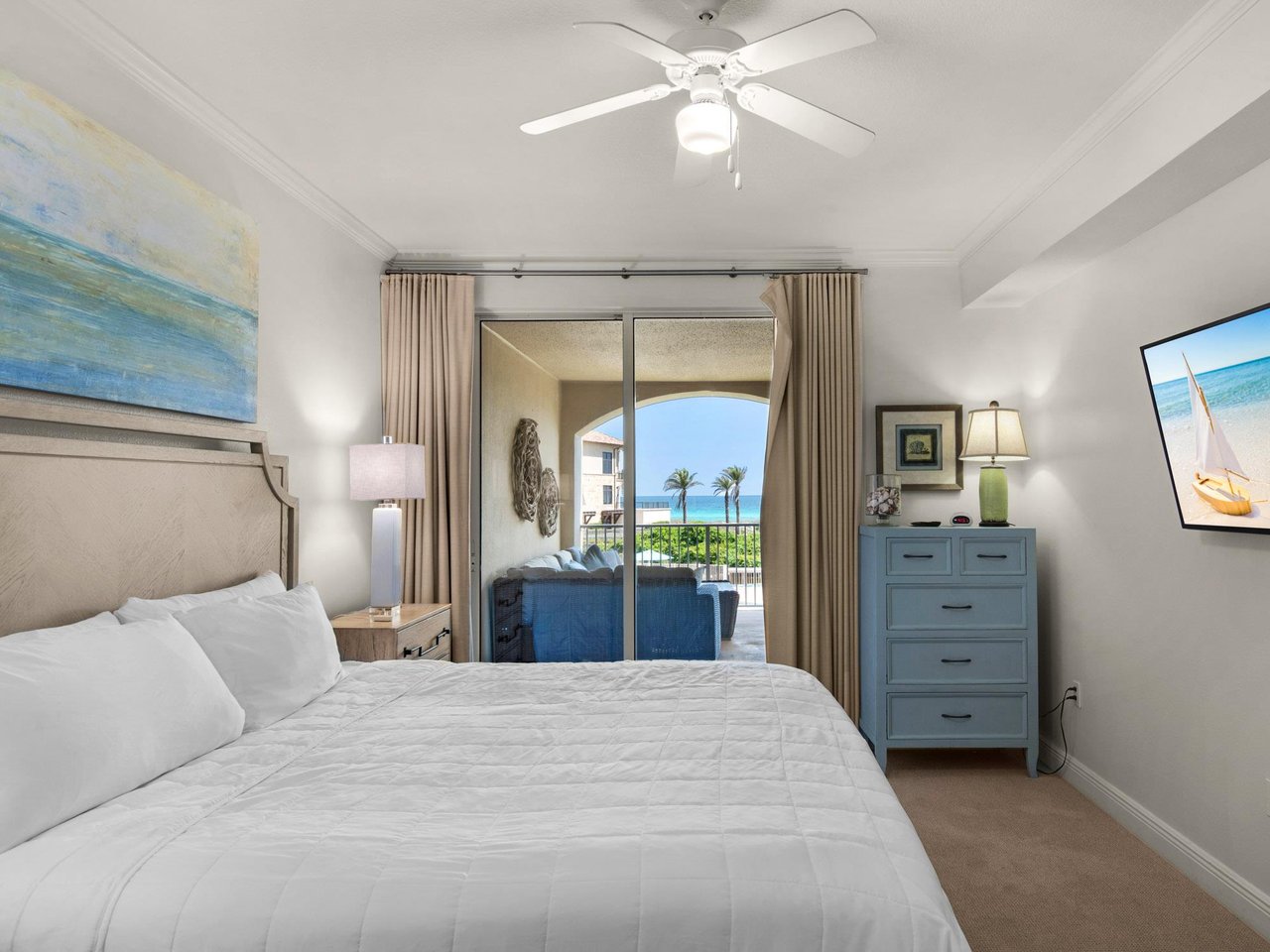 Primary Bedroom with King Bed and Private Balcony Access
