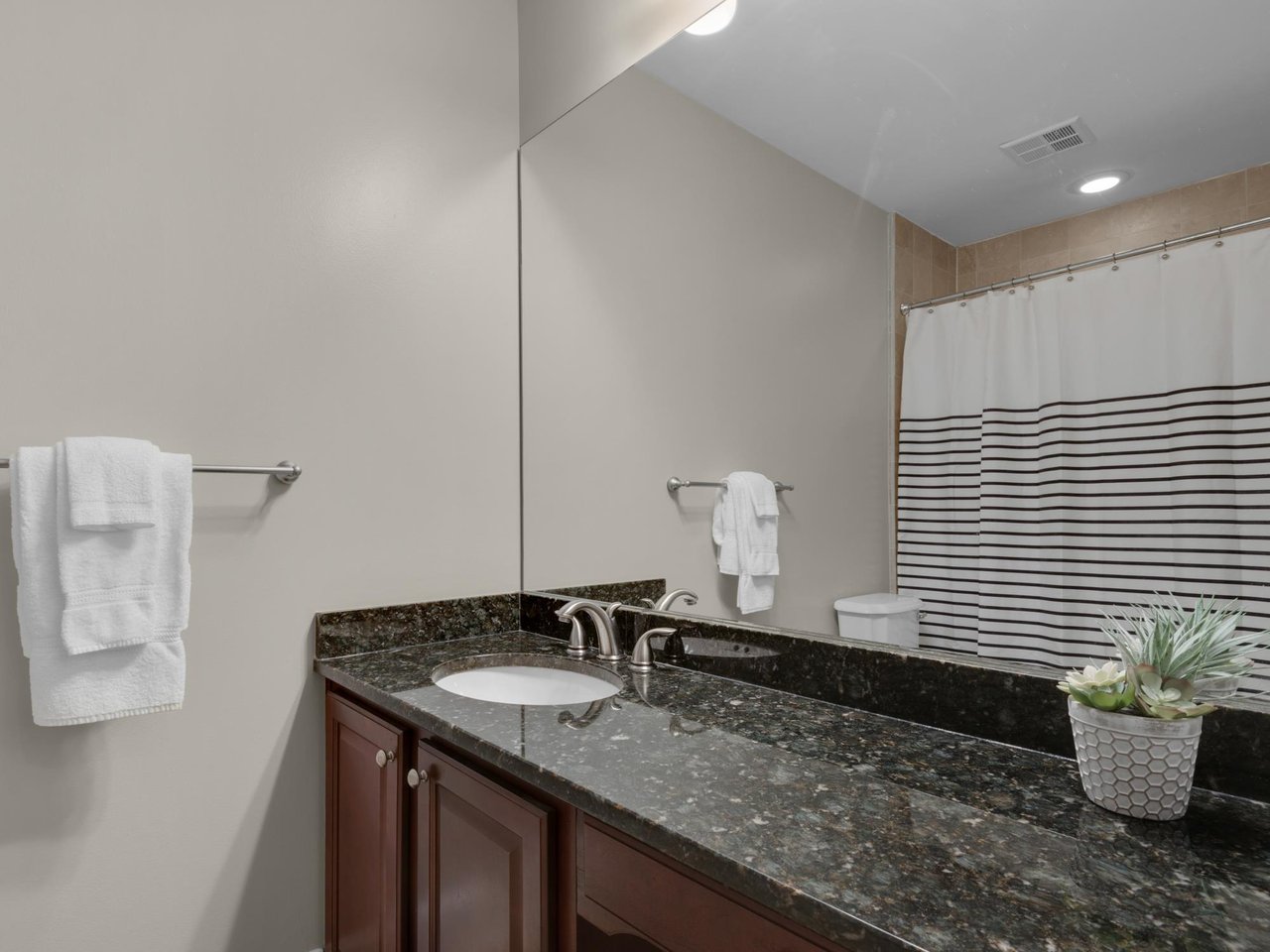 Queen guest room with private bathroom