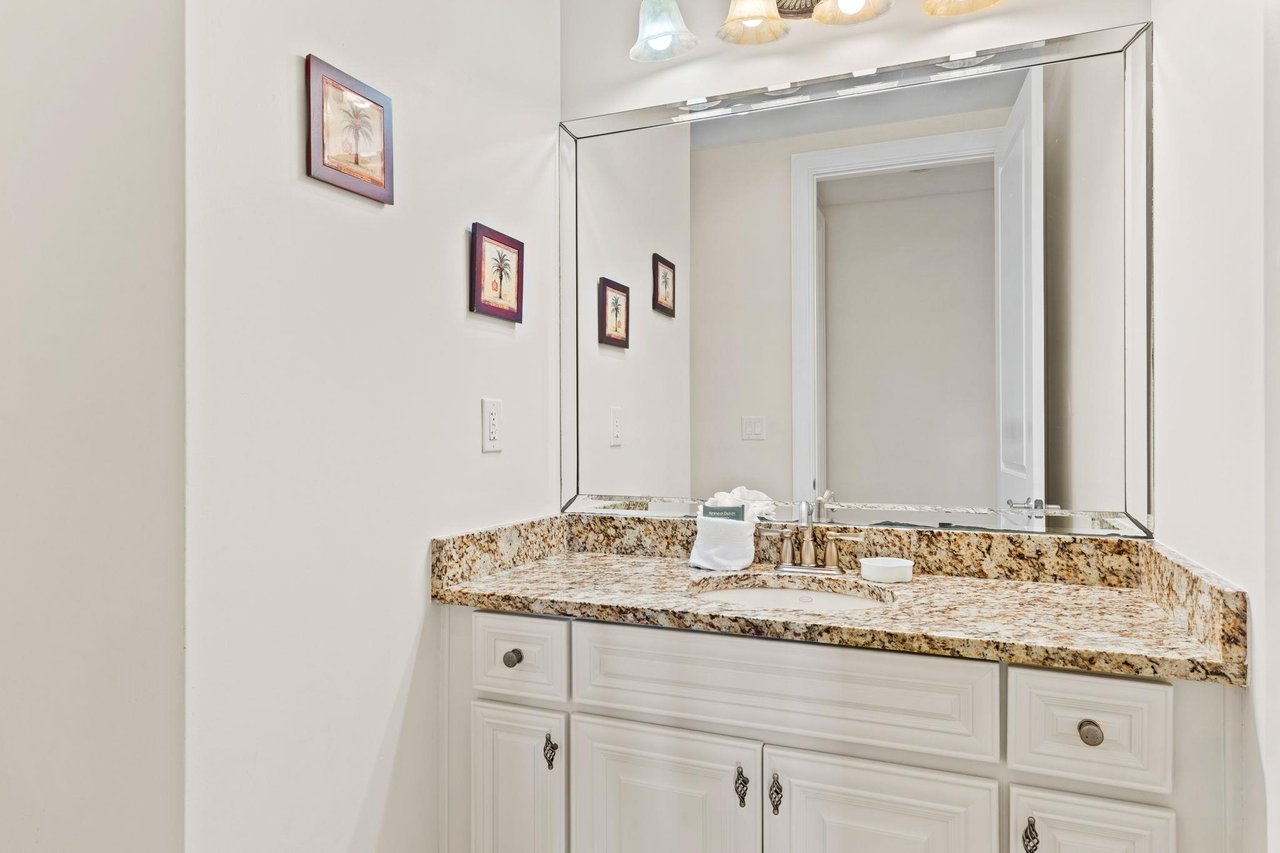 Half Bath in Hallway on 1st Floor