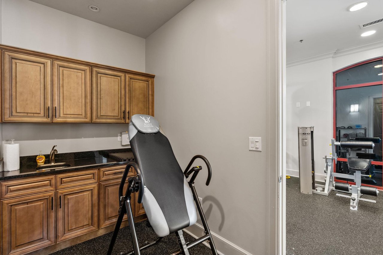 2191172 A Kitchen With A Chair And A Table