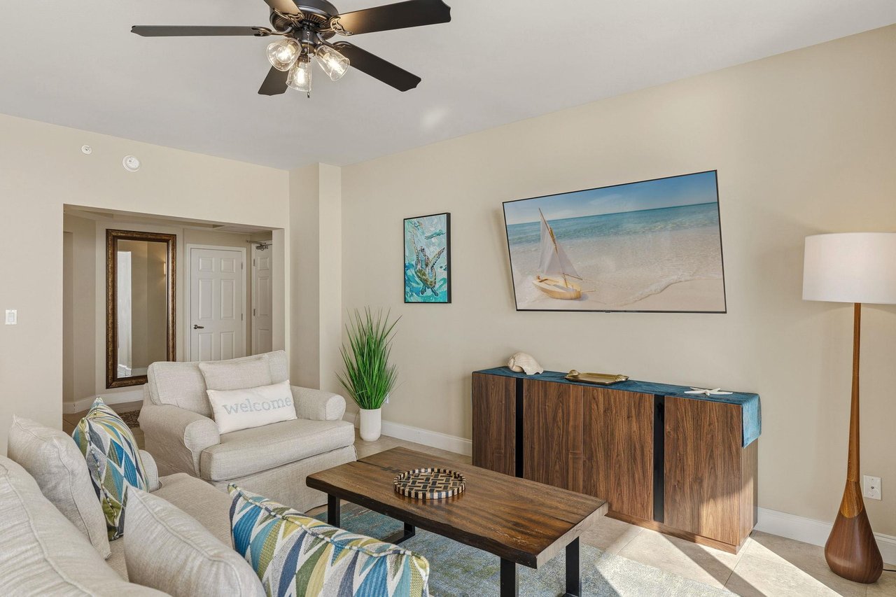Relax in your bright living room with coastal artwork and comfortable seating that makes you feel right at home.  Plus there is a sleeper sofa for additional guests.