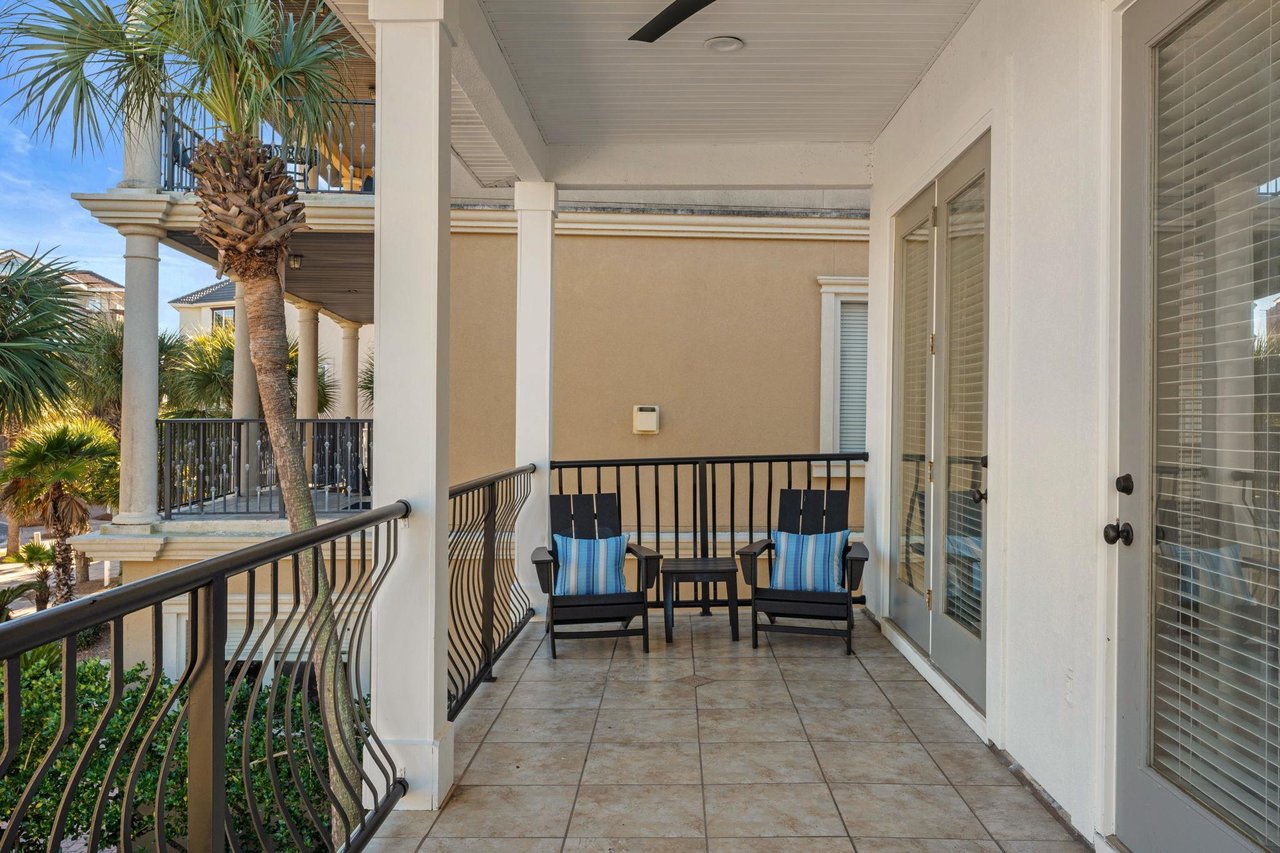 Enjoy the Gulf Winds and Fresh Salty Air on the Large Private Balcony off the Main Living Area on the 2nd Floor