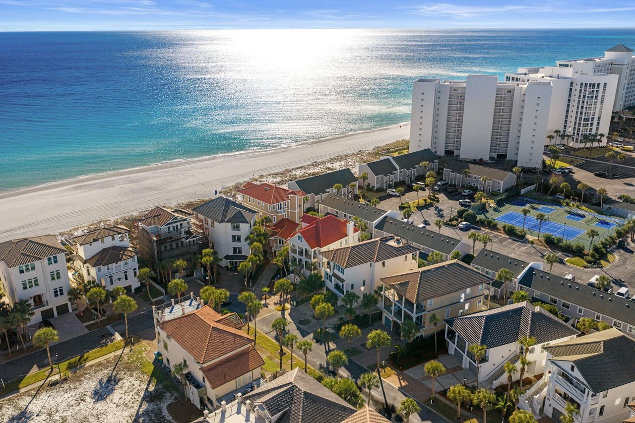Stunning beachfront location with pristine white sand and crystalclear waters just steps from these coastal vacation homes.