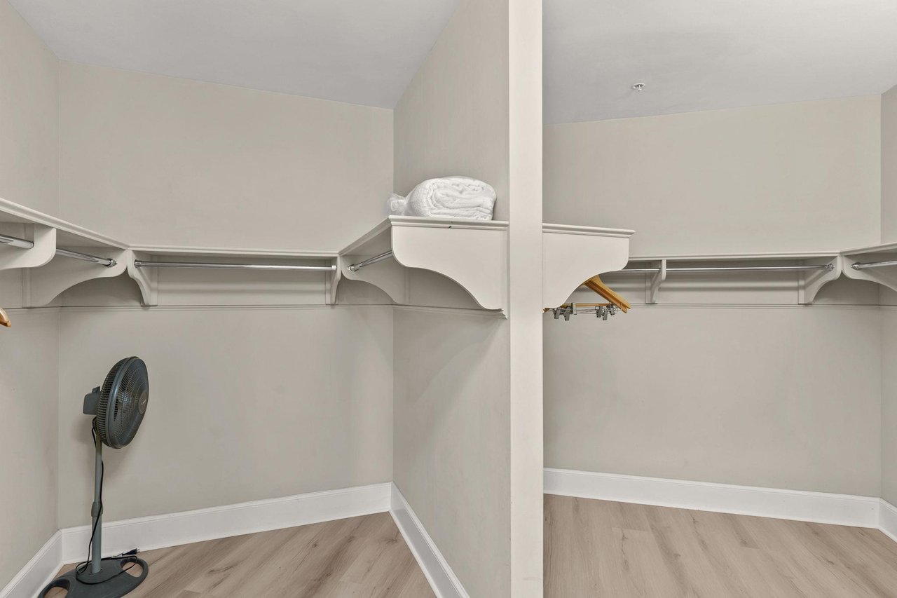 Your spacious walkin closet offers abundant hanging space and thoughtful organization for all your vacation wardrobe needs.
