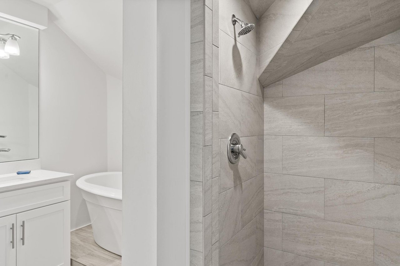 Indulge in your private spalike retreat with a rainfall shower.