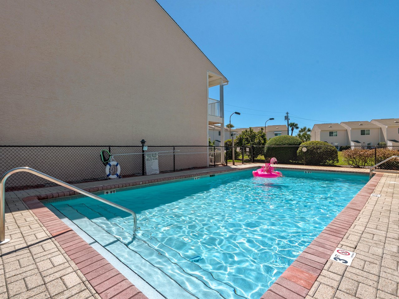 Dive into crystalclear waters surrounded by coastal charm and sunny skies