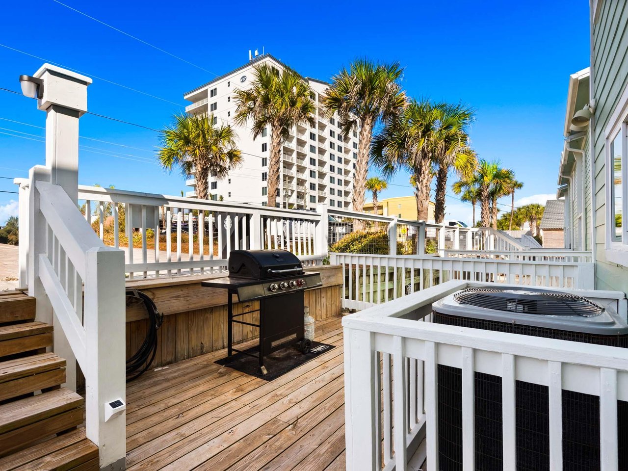 Your front porch offers BBQ grilling. A perfect outdoor cooking retreat.