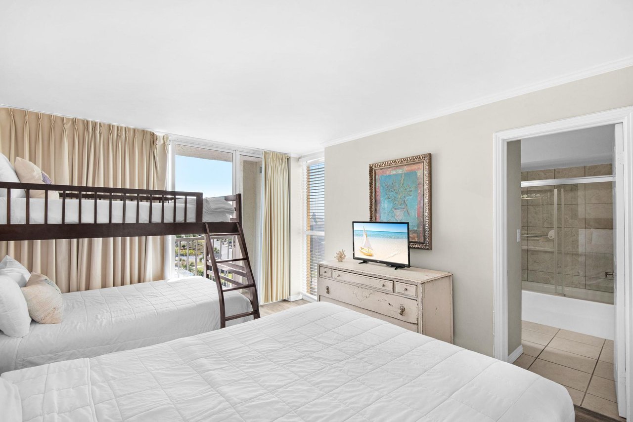 Bedroom 2 with flat screen tv.