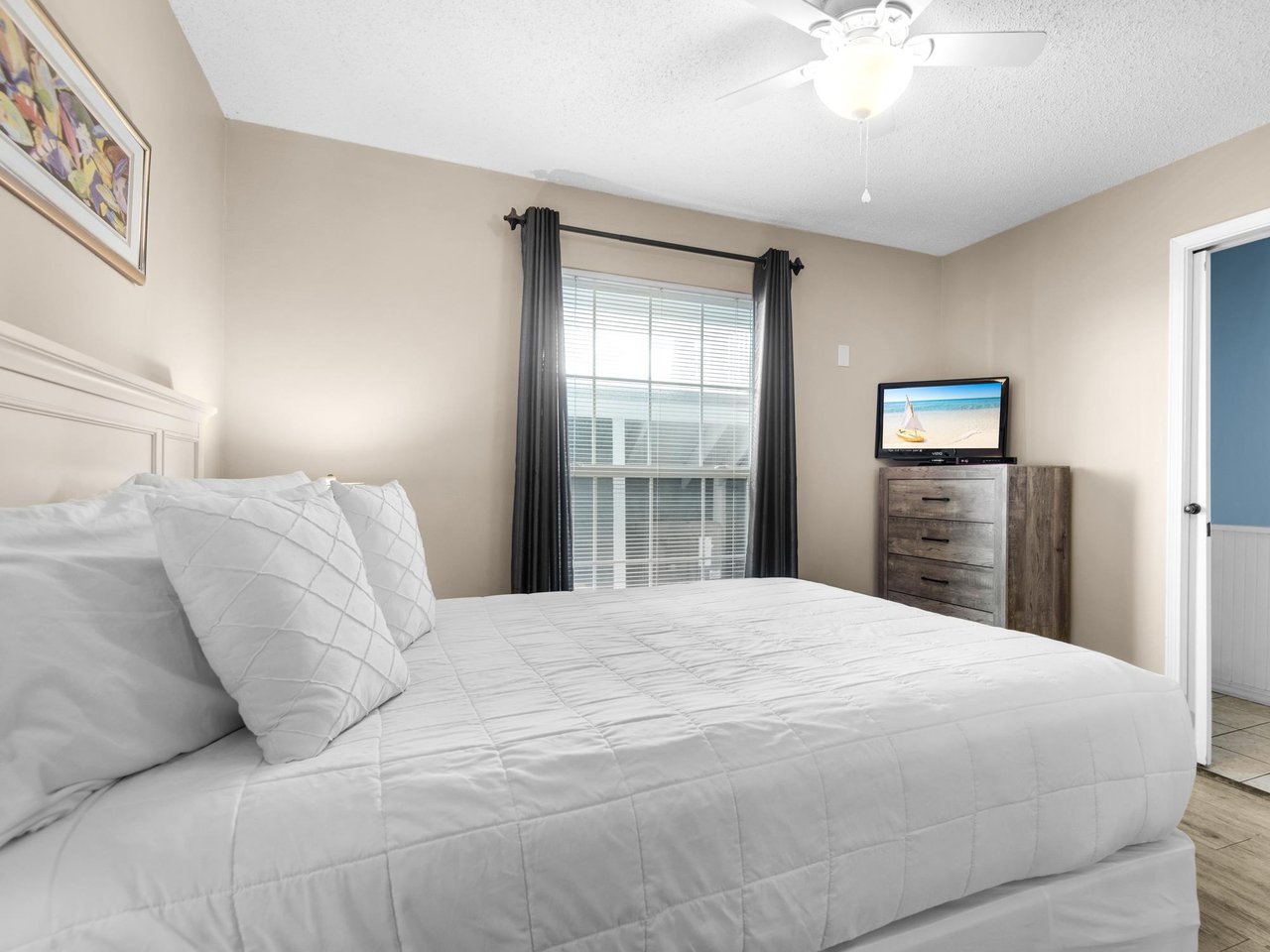 Bedroom 3  Drift off peacefully in your bedroom with neutral walls and coastal charm.