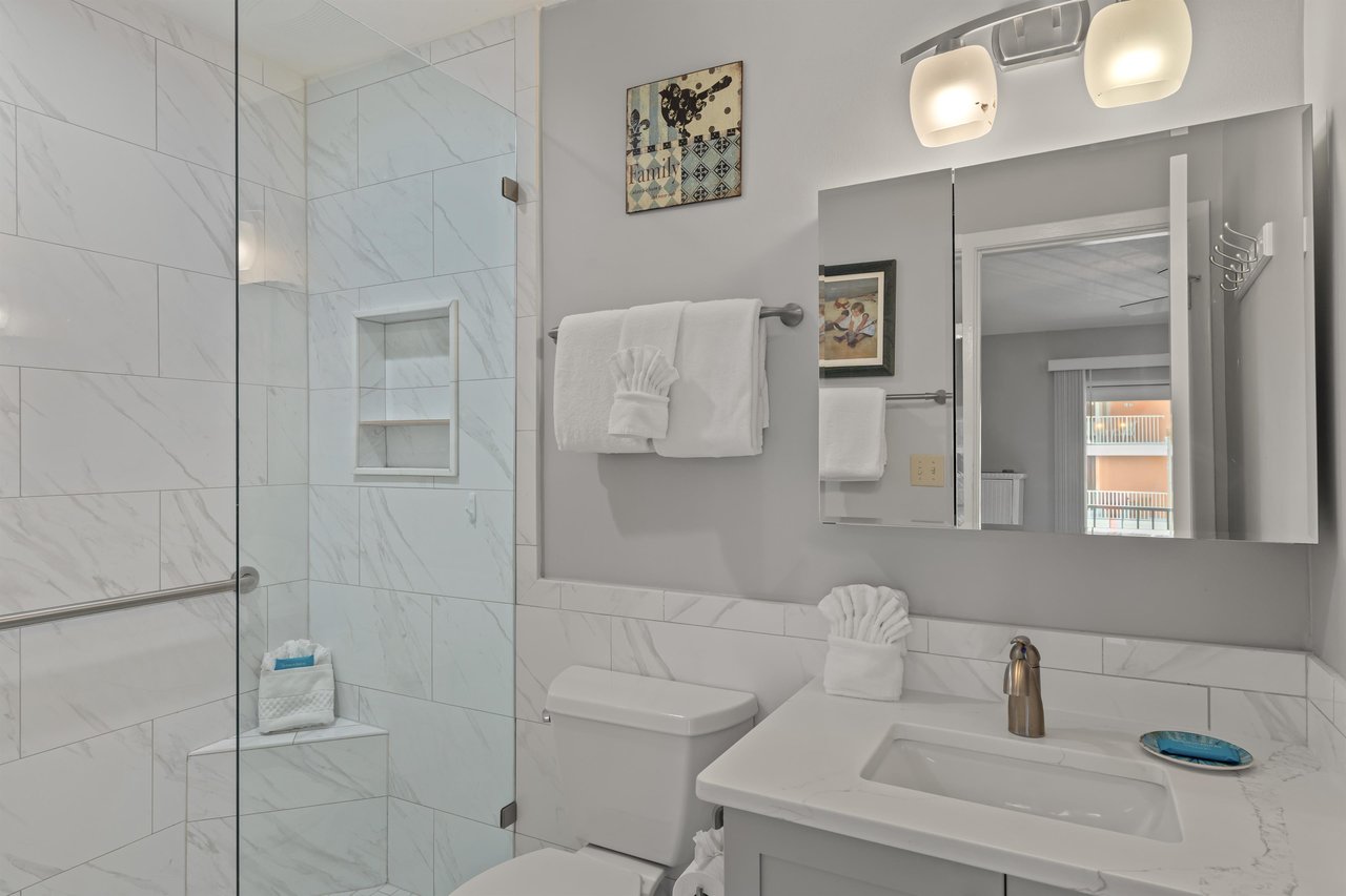 Bathroom 1 featuring walkin shower