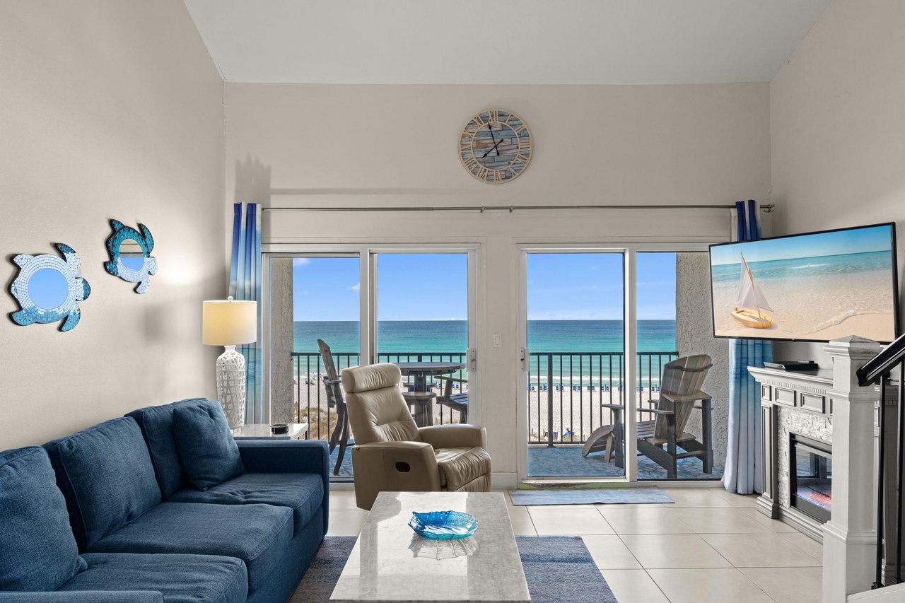 Your private sanctuary awaits with sweeping ocean views framing every moment. Relax in coastal comfort as turquoise waves greet you each morning through expansive balcony doors.