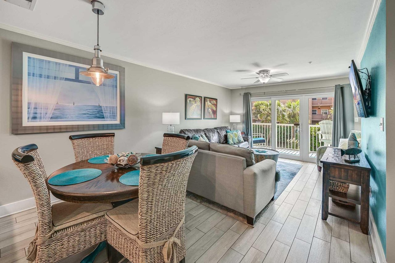 Relax in your coastalinspired living space, where natural light pours through sliding doors leading to your private balcony.
