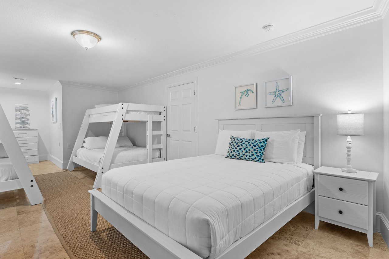 Bedroom 4 on 1st Floor with 2 Twin over Full Bunks and Regular Bunk  and 1 Queen Bed