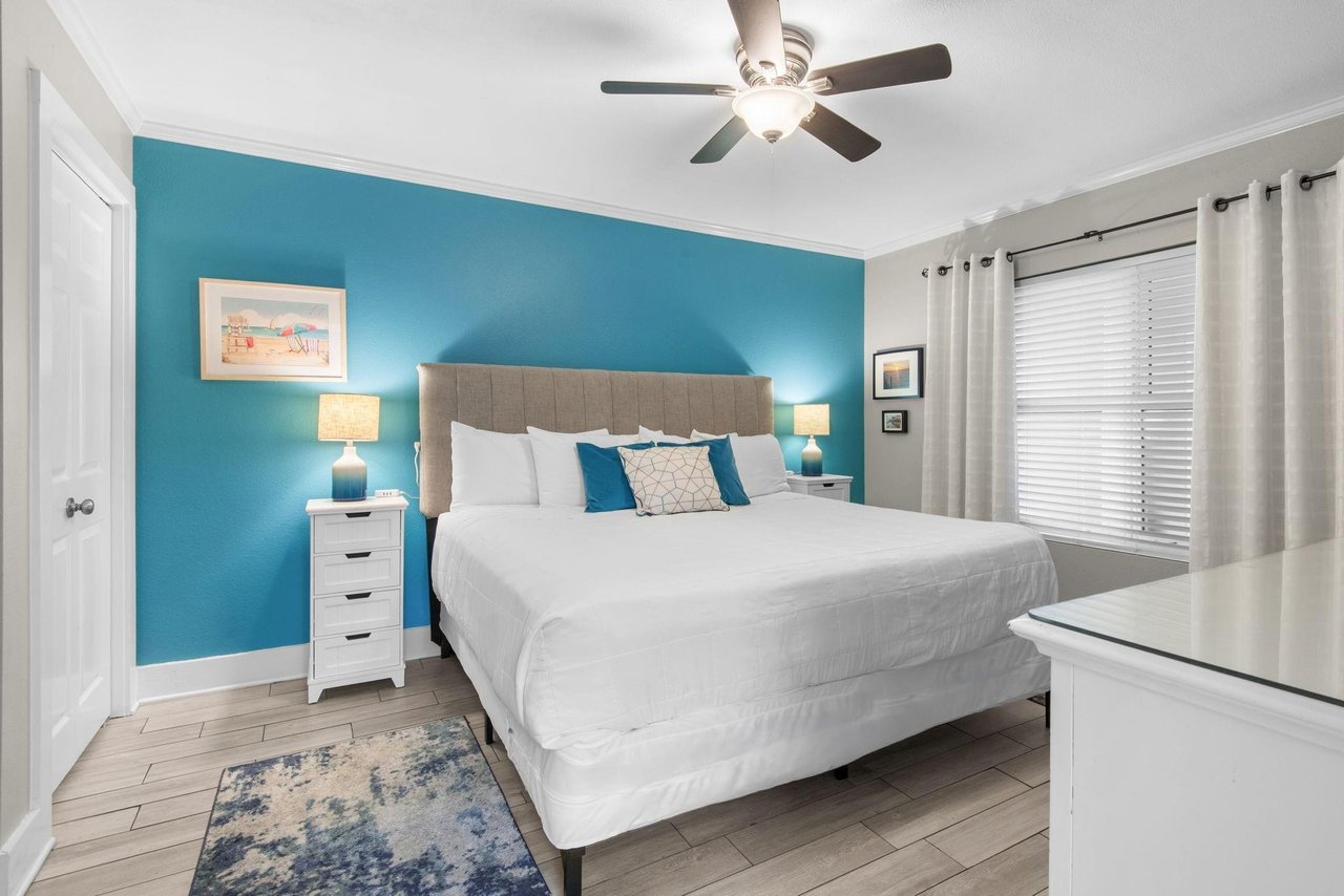 Enjoy the comfort of your bedroom and let the coastal colors melt your stress away in this serene bedroom retreat.