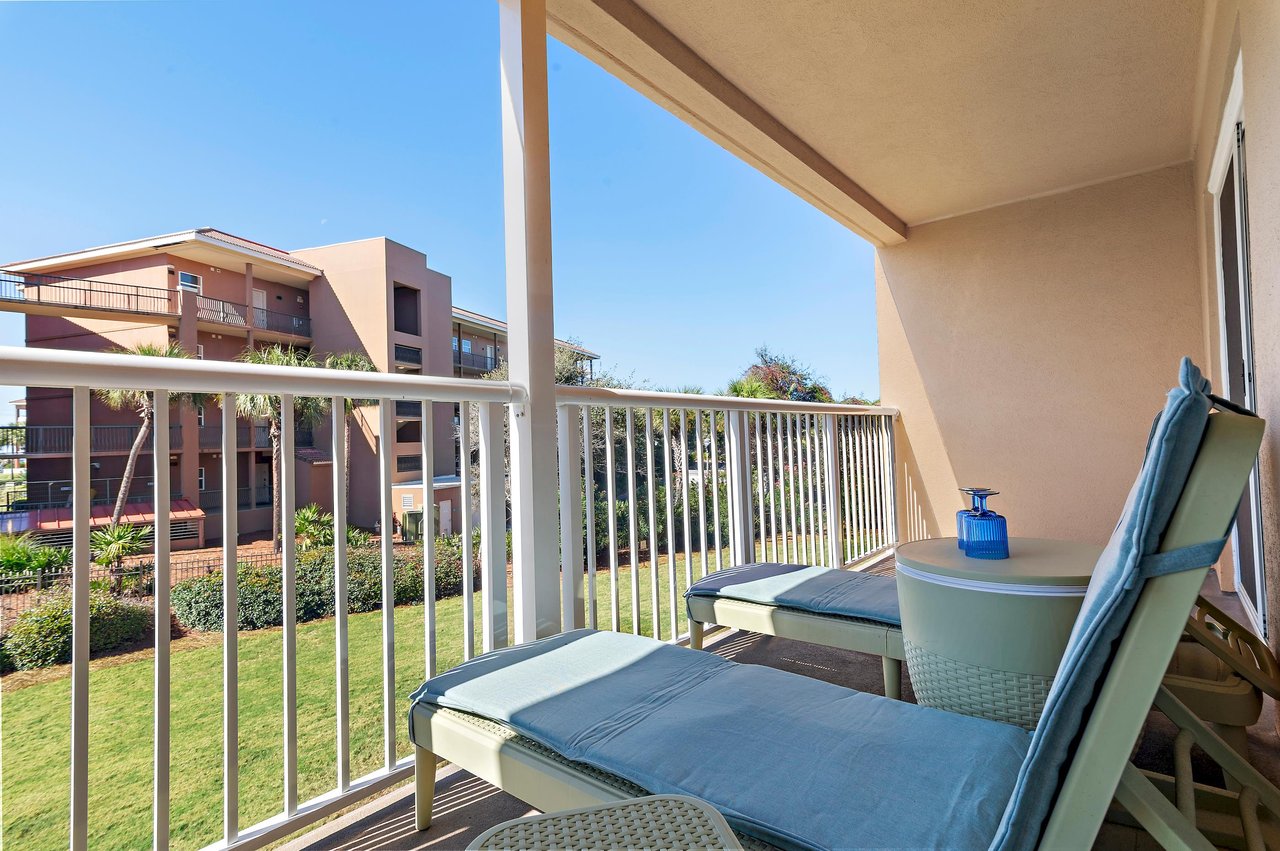 Step onto your private balcony and sink into a plush lounger, perfect for soaking up the sun or enjoying your morning coffee.