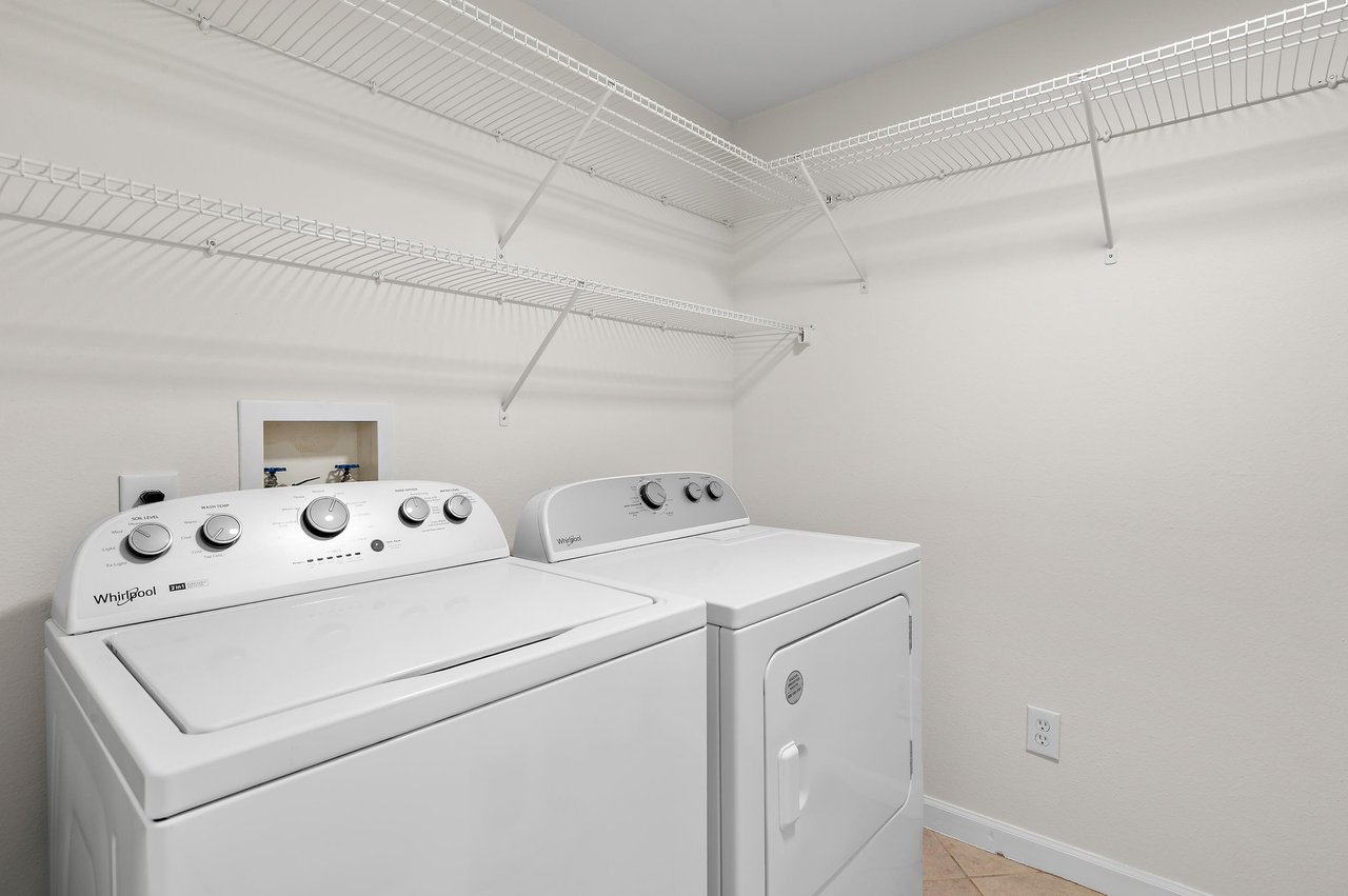 Your own inunit washer and dryer make laundry day effortless, with ample storage overhead to keep supplies neatly tucked away.