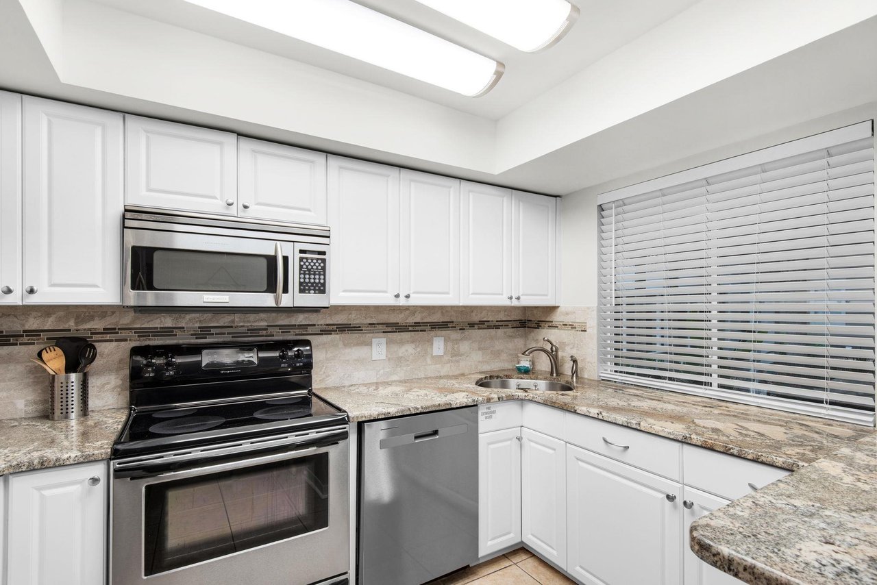 Cook your favorite meals in this fully equipped kitchen with modern appliances and ample counter space for all your culinary adventures.