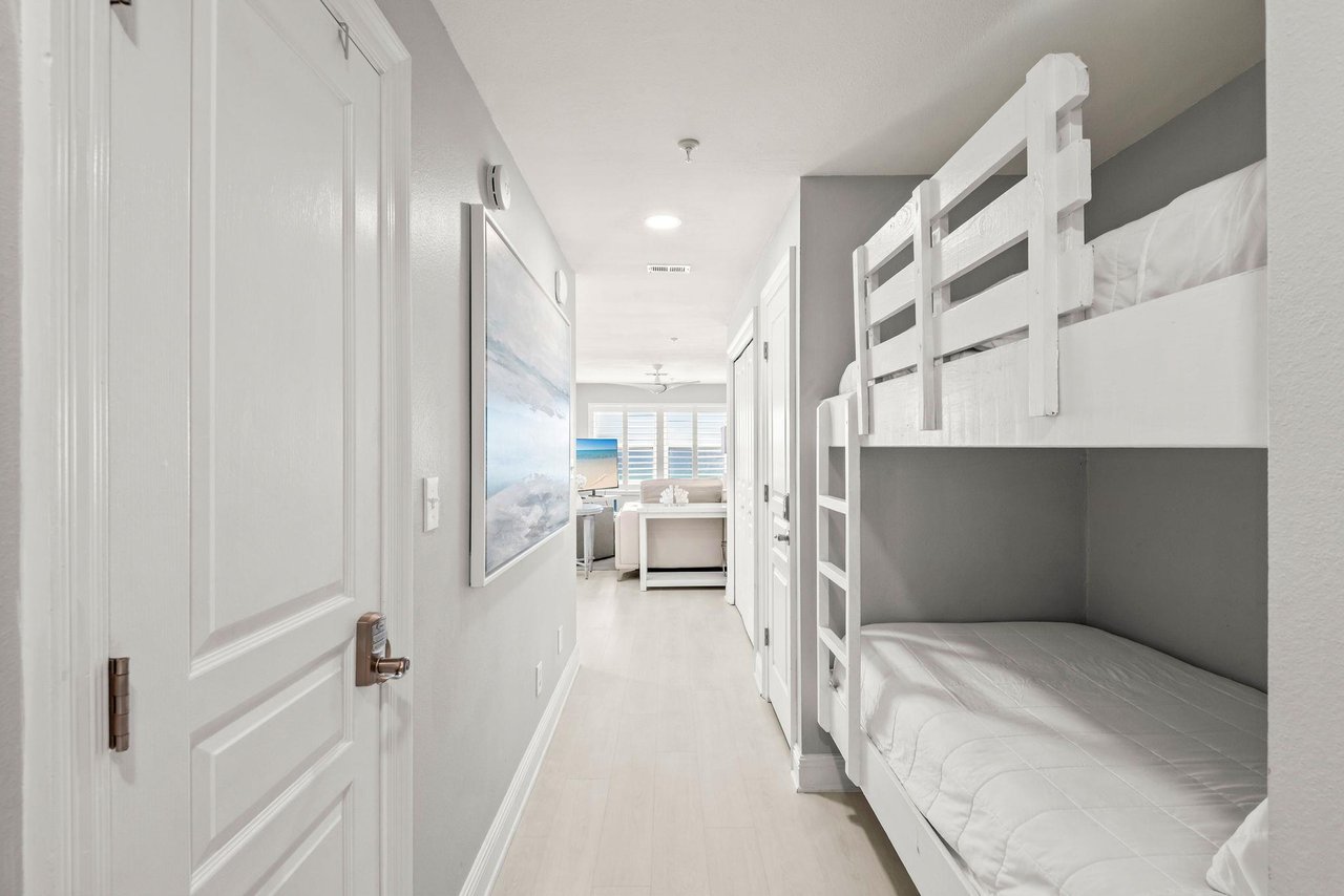 Bright hallway connects your sleeping quarters to the rest of the space, with a cozy bunk nook perfect for kids.