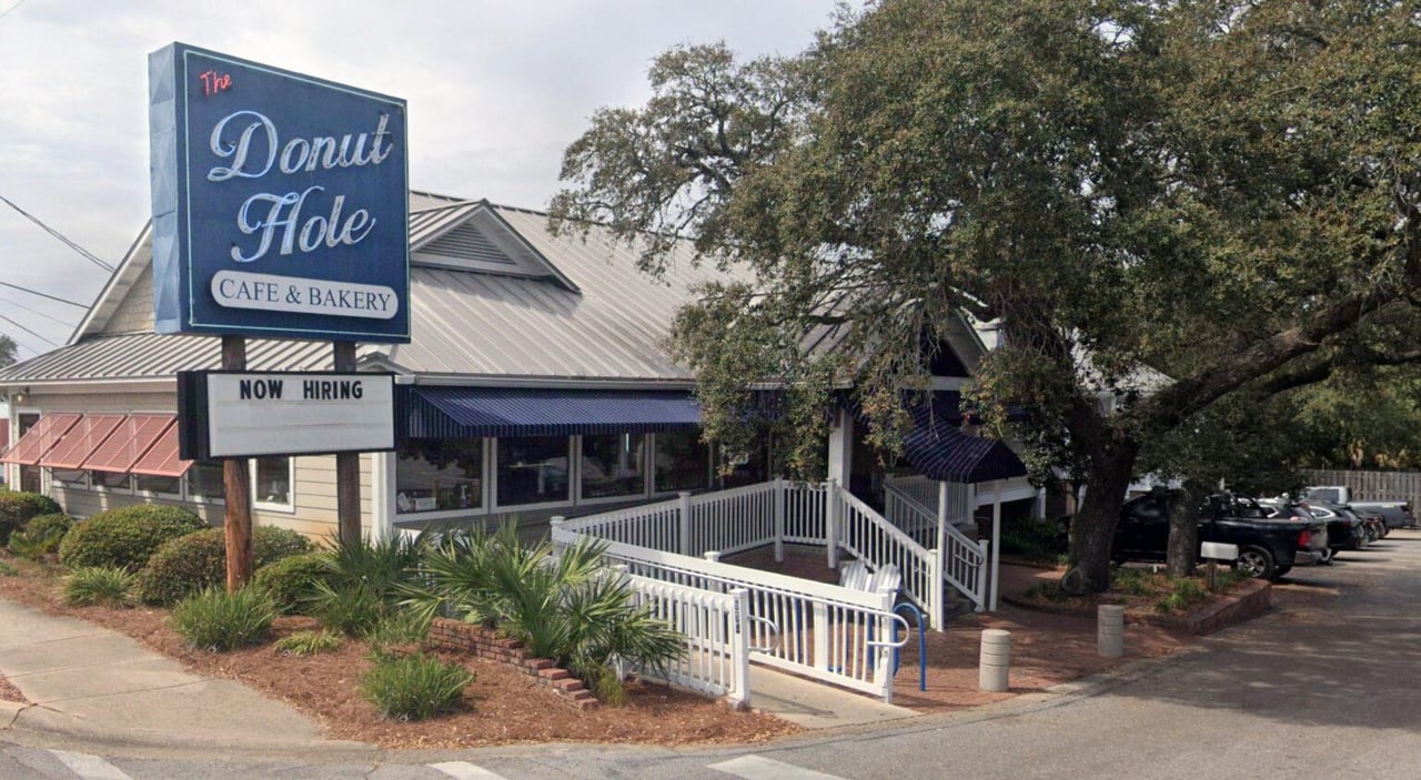 a building with a sign in front