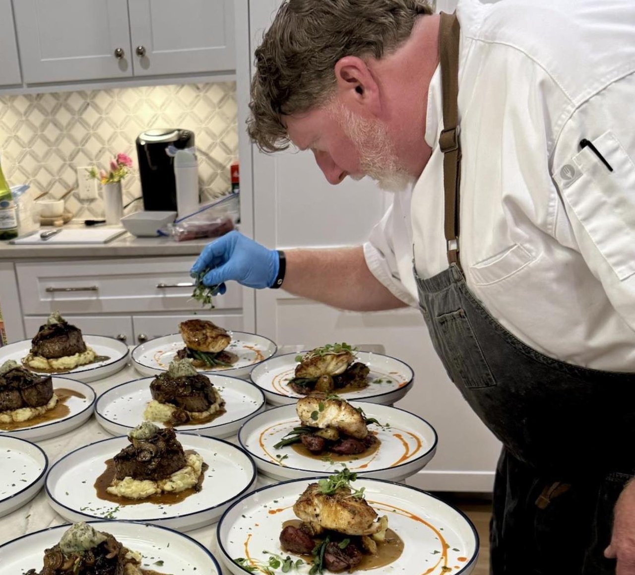 a chef preparing food on a table