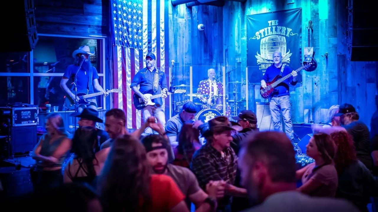 2277255 A Group Of People On Stage Playing Instruments