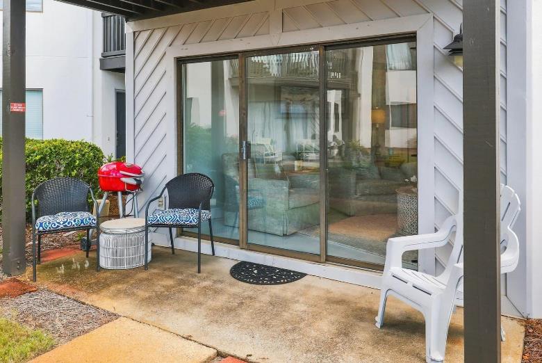 Your private patio offers a cozy retreat with comfortable seating, perfect for morning coffee or evening sunsets.