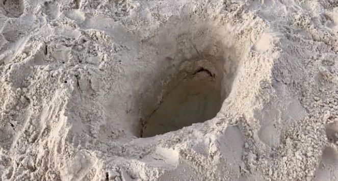 hole on the beach