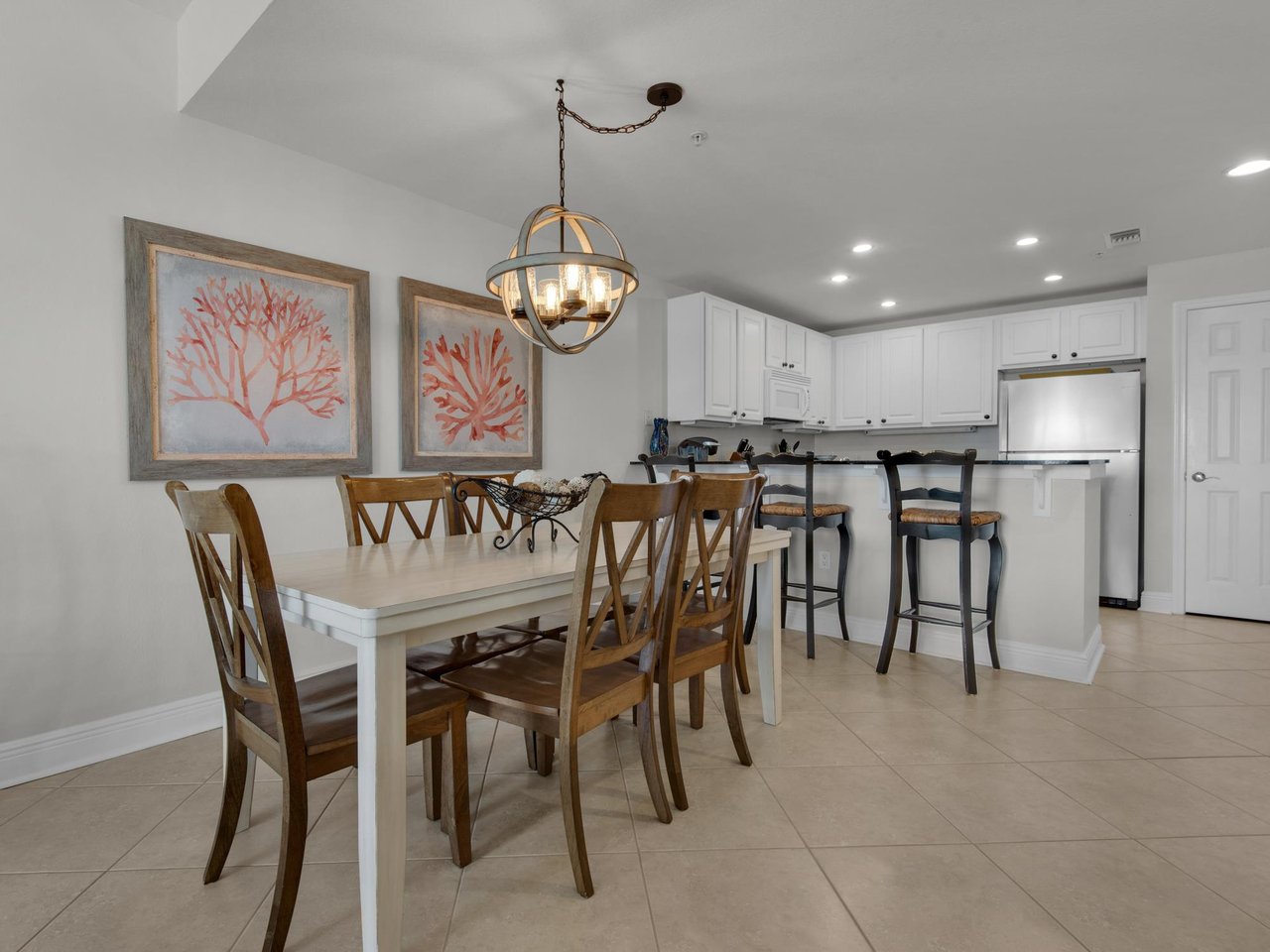 Dining area with table for 8 and breakfast bar seating