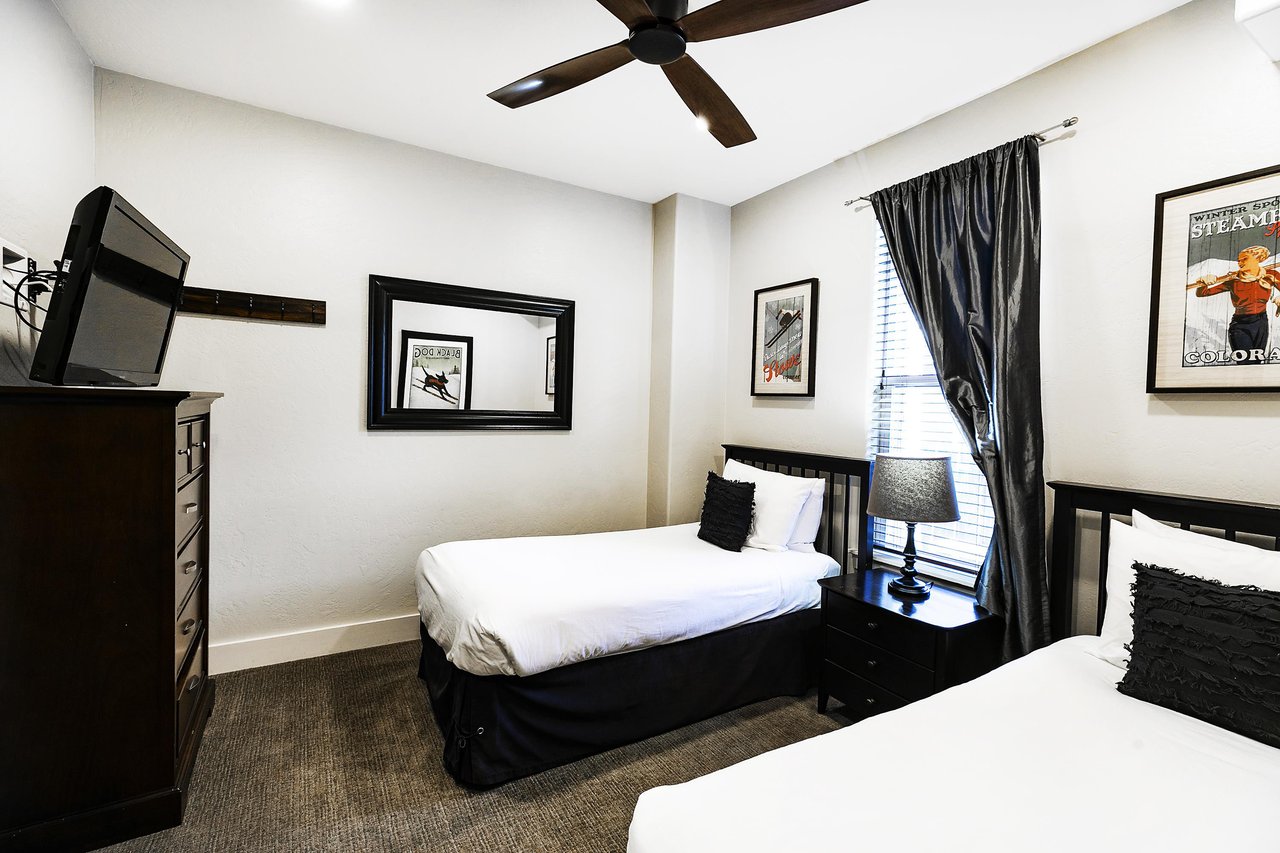 Twin beds in the guest bedroom can be converted to a king bed with advanced notice