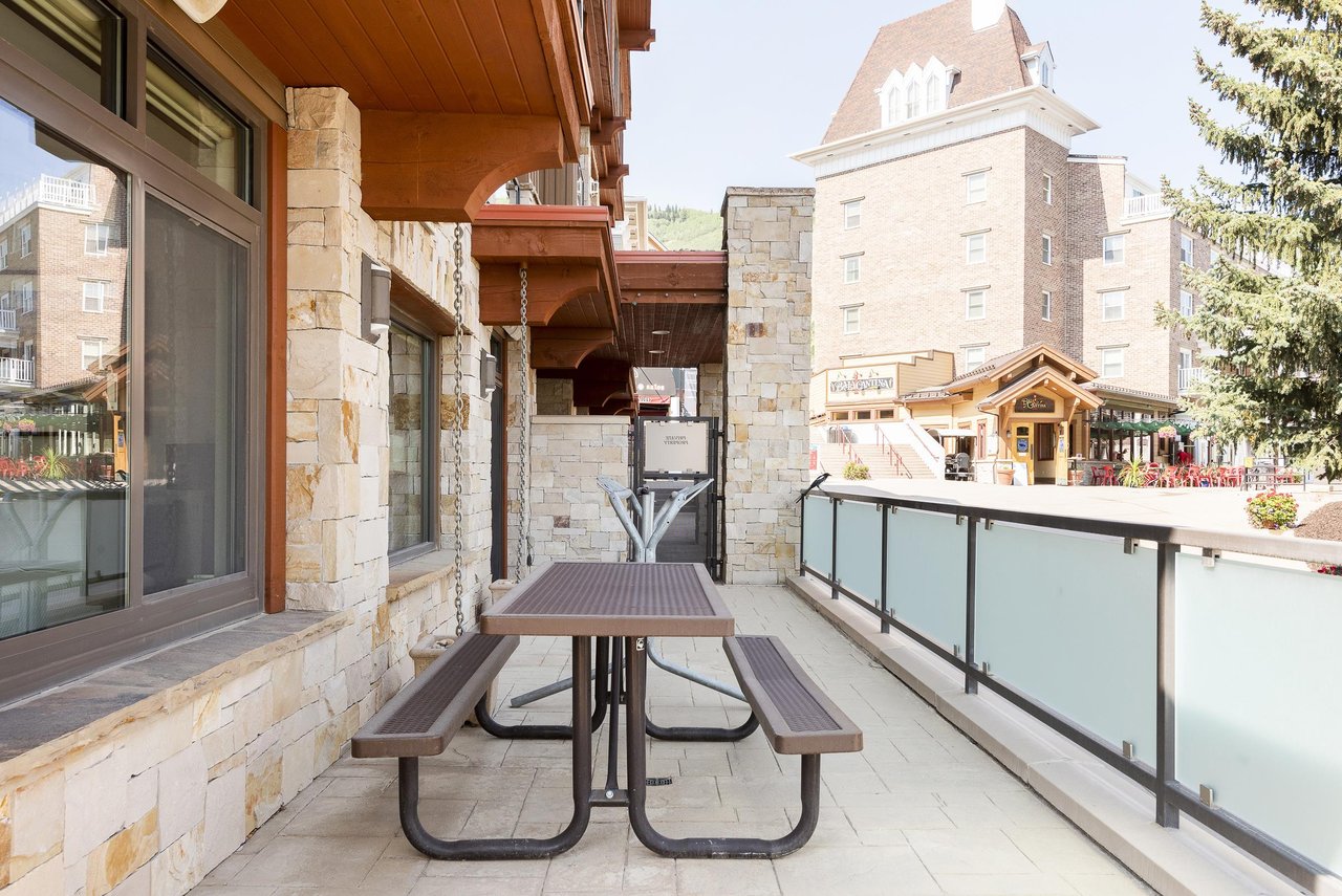 Large picnic table on the private patio with access to Park City Mountain Plaza