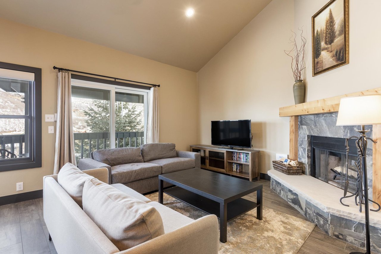 Spacious living room with entertainment center