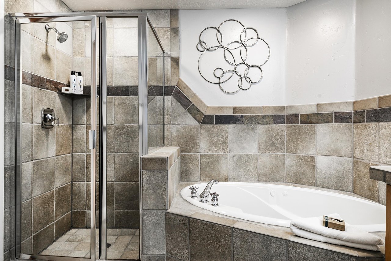 Enjoy the jetted soaking tub and separate walk in shower