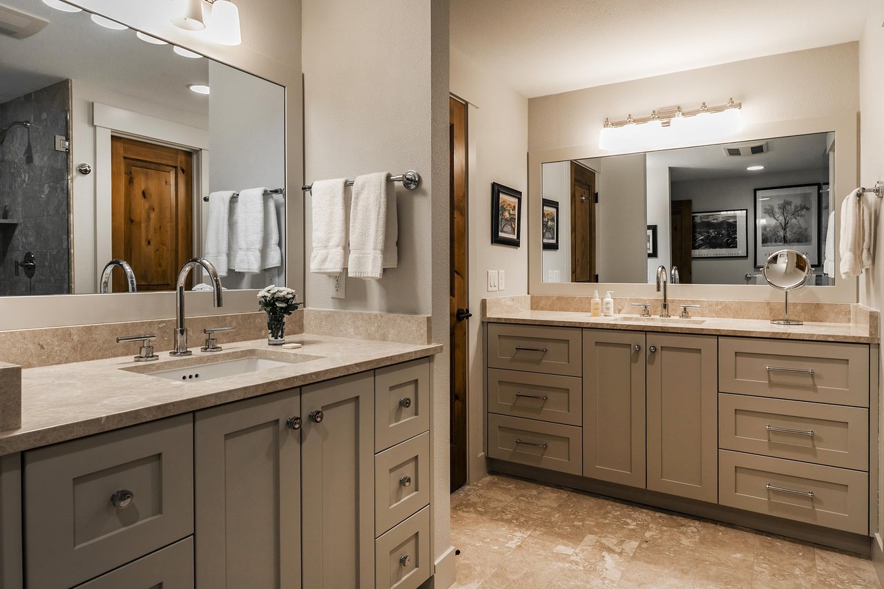 Ensuite main bathroom includes two vanities