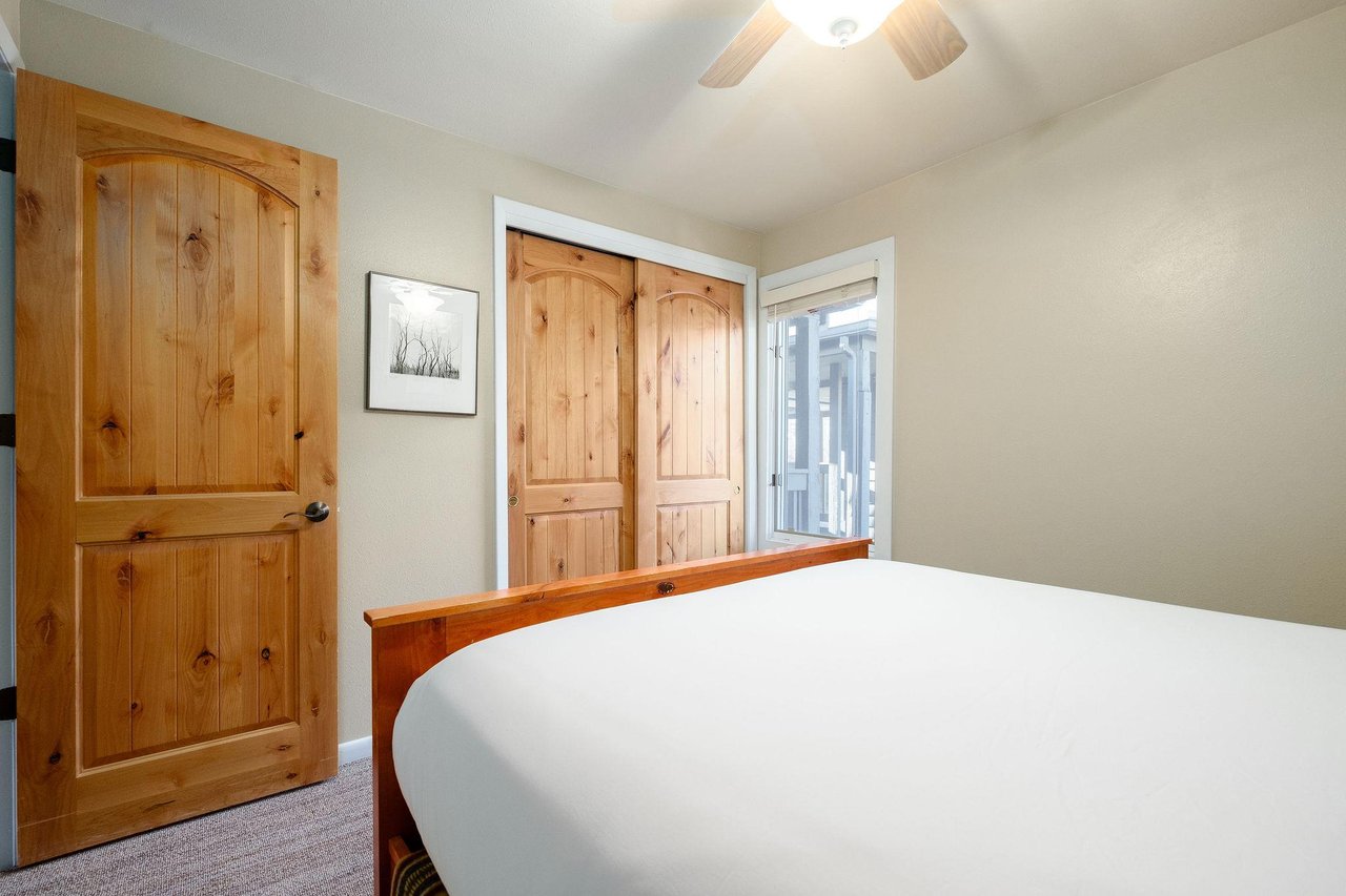 Queen bed in the guest bedroom