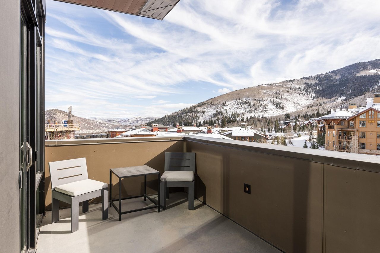 Main bedroom secluded relaxation on the private patio overlooking the mountains