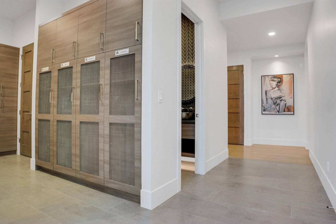 Vacation rental ski storage built in cabinets.