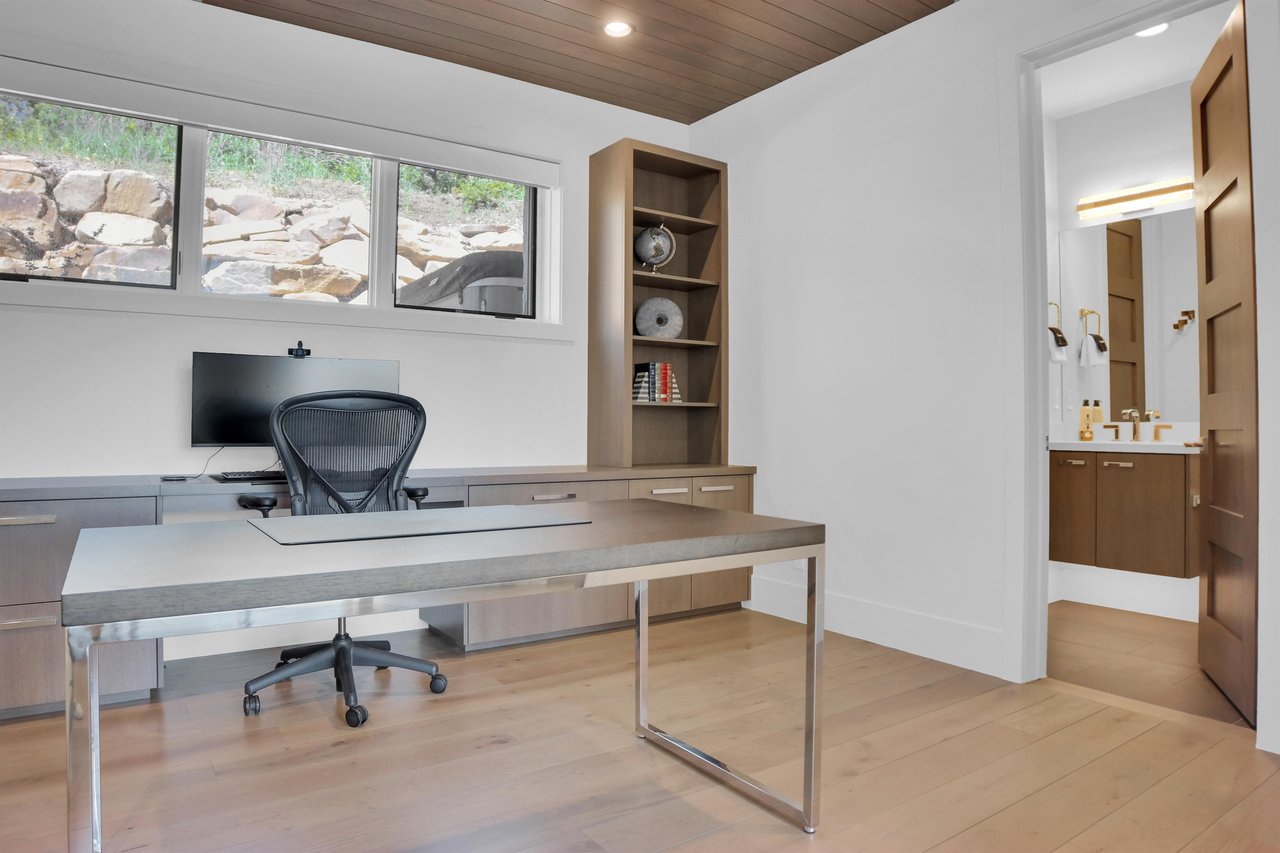 Vacation rental private office with two large work spaces.