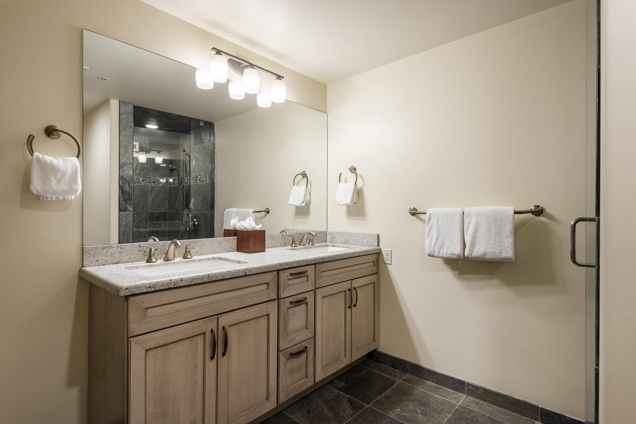 The fourth bedroom has an en suite bathoom with walk in shower.