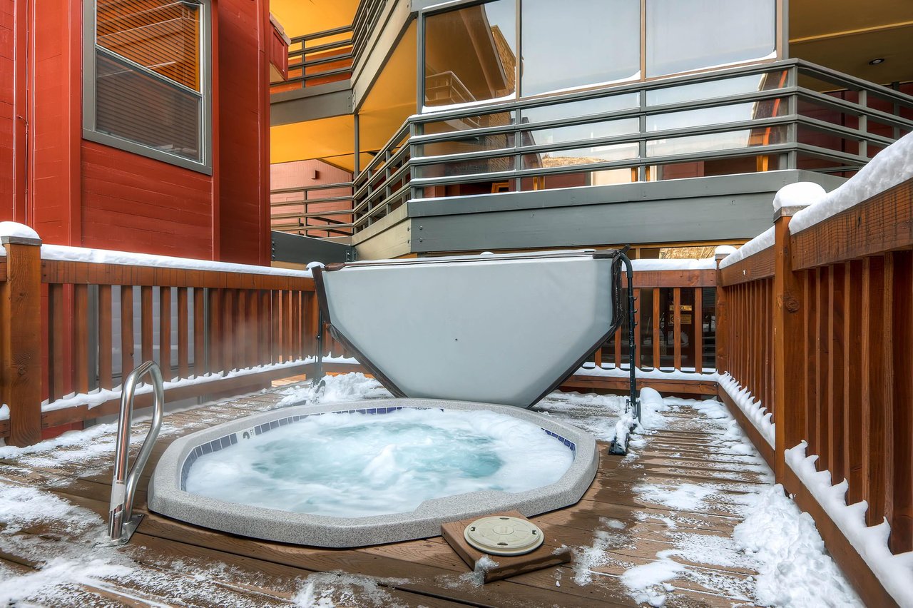 Common area hot tub with decking around to make it a more level entry